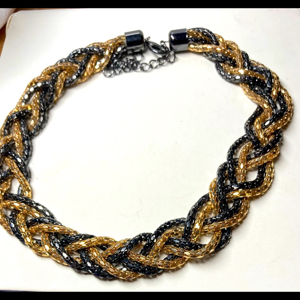 Six strand necklace in black and gold. #525